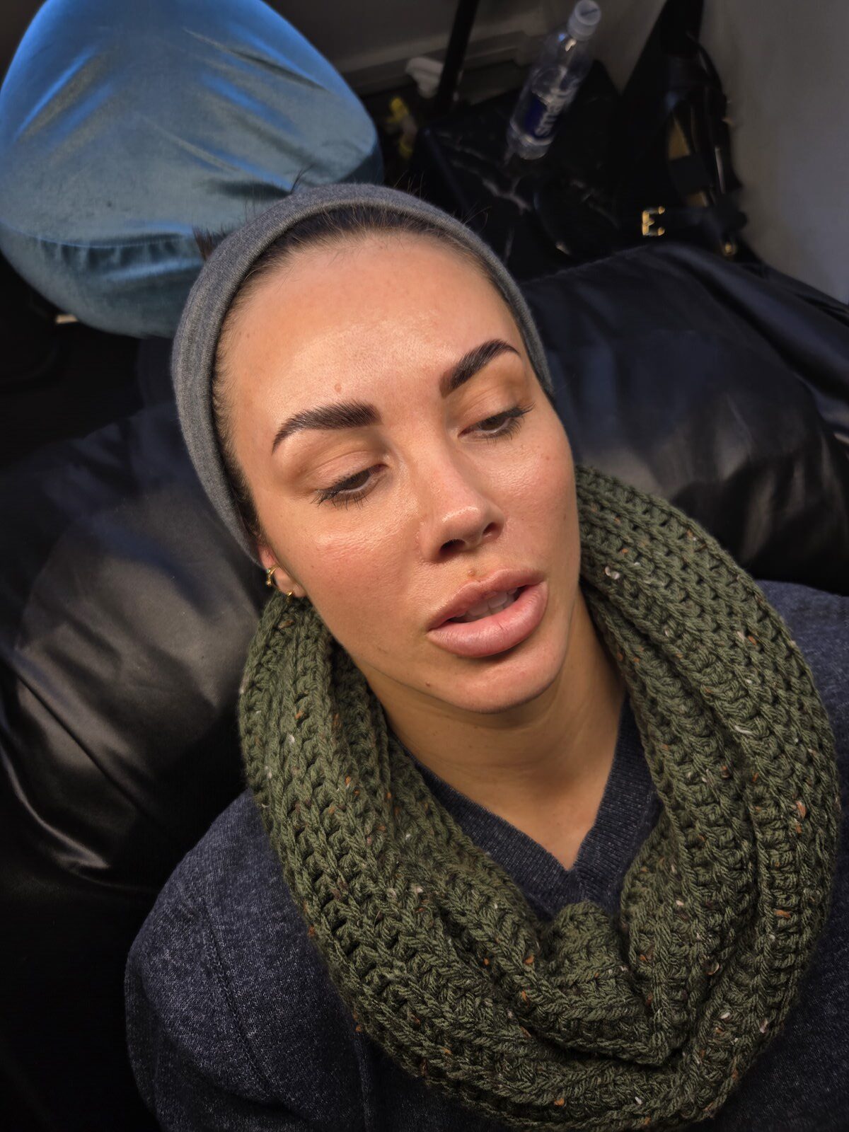 Before-and-after result showing brow lamination with hybrid tint and skin stain over faded permanent eyebrow makeup at Wink Lash Art in Alexandria, VA.